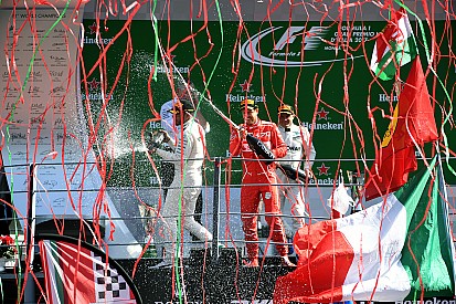 Die Geschichte zum Bild: Luftschlangen auf dem F1-Podium in Monza