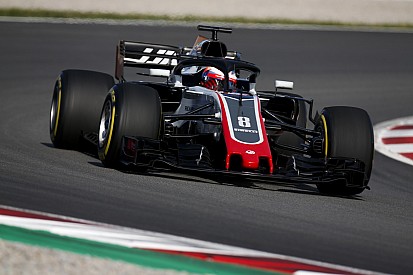 Grosjean quickest as Barcelona test kicks off