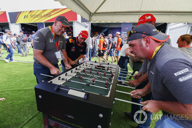 Fans play table football in the F1 Fanzone