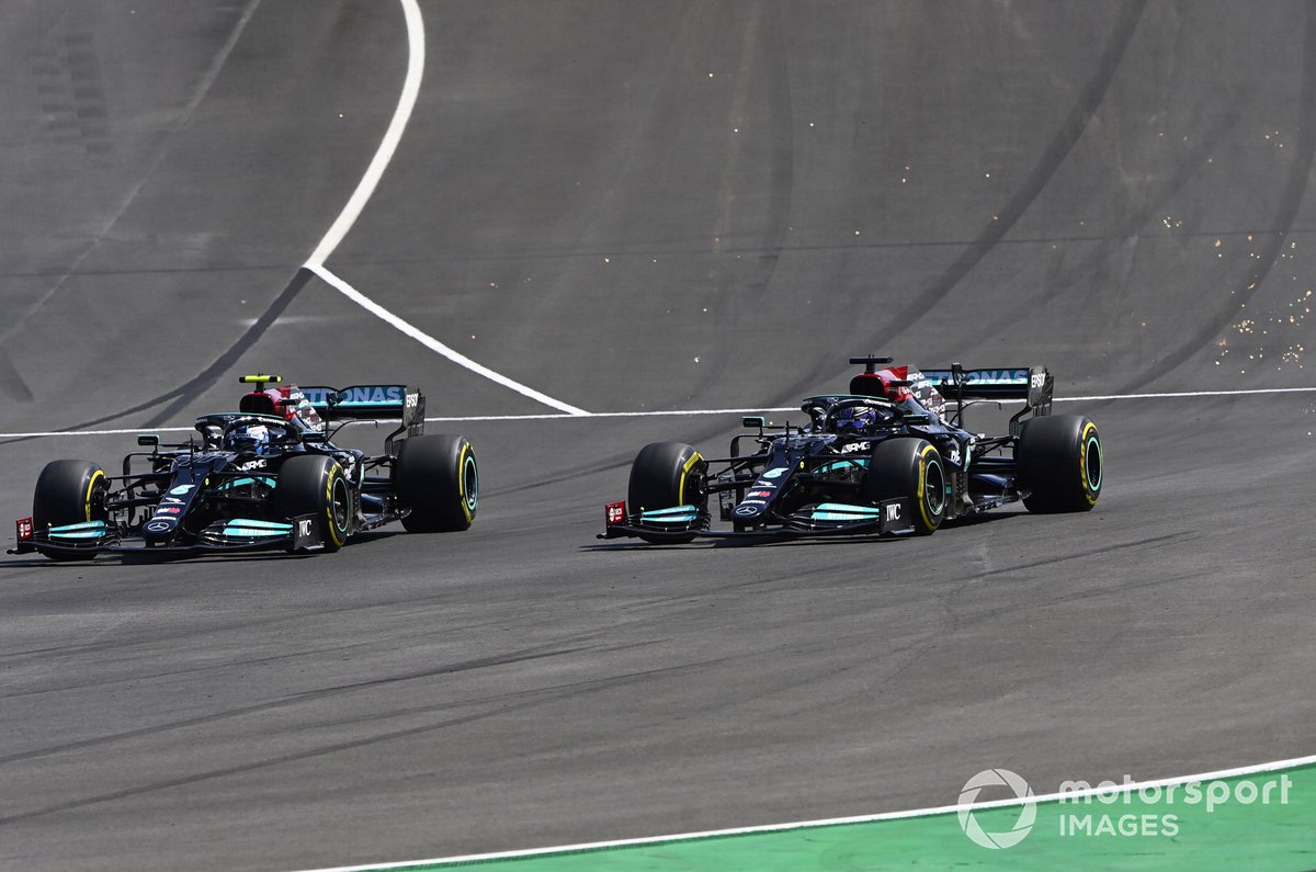 Lewis Hamilton, Mercedes W12, battles with Valtteri Bottas, Mercedes W12
