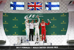 Second place Valtteri Bottas, Mercedes AMG F1, Peter Bonnington, Race Engineer, Mercedes AM, Race winner Third place Lewis Hamilton, Mercedes AMG F1 Kimi Raikkonen, Ferrari, on the podium