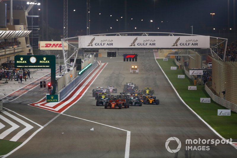 Sebastian Vettel, Ferrari SF90, leads Charles Leclerc, Ferrari SF90, Lewis Hamilton, Mercedes AMG F1 W10, Valtteri Bottas, Mercedes AMG W10, Max Verstappen, Red Bull Racing RB15, Kevin Magnussen, Haas F1 Team VF-19, and the rest of the field at the start