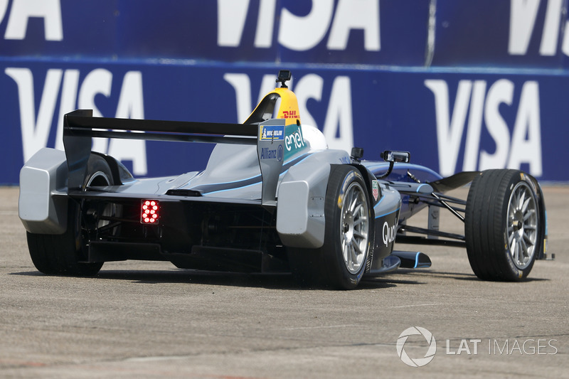 Model Emily Ratajkowski, drives the Formula E track car