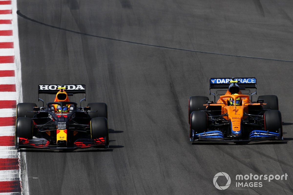 Sergio Perez, Red Bull Racing RB16B, battles with Lando Norris, McLaren MCL35M