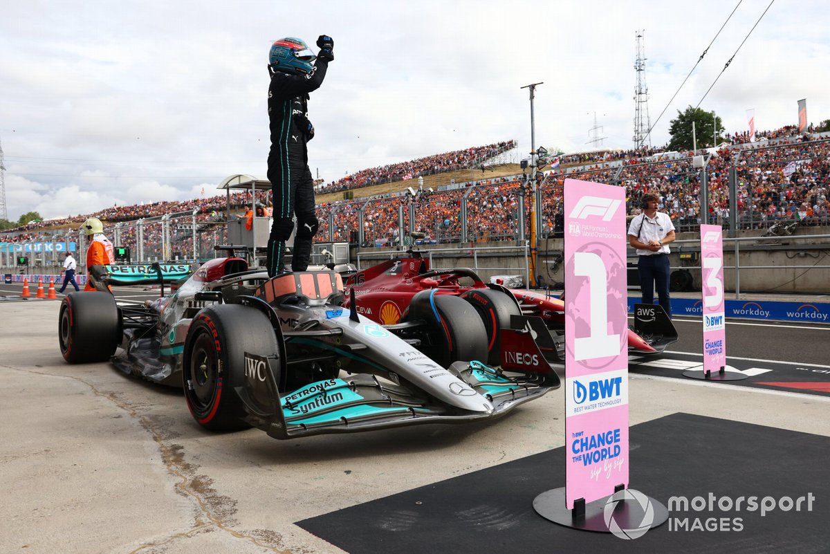 George Russell, Mercedes-AMG, celebrates pole position in parc ferme