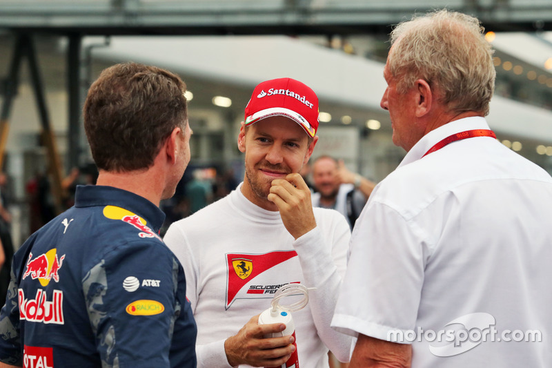 (L to R): Christian Horner, Red Bull Racing Team Principal with Sebastian Vettel, Ferrari and Dr Hel