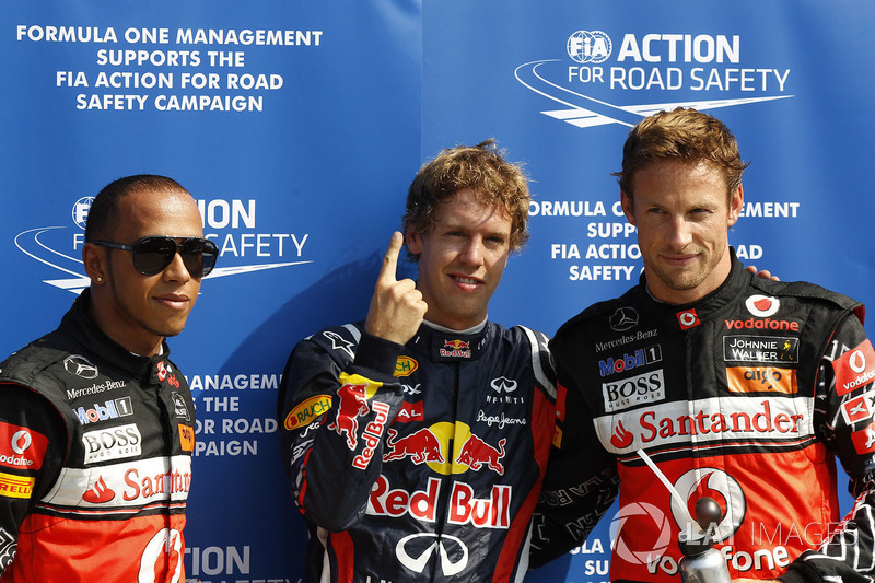 Polesitter Sebastian Vettel, Red Bull Racing, second place Lewis Hamilton, McLaren and third place