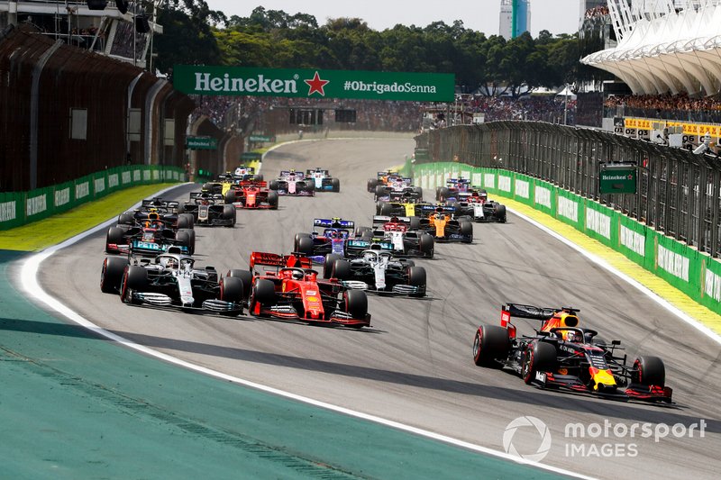 Max Verstappen, Red Bull Racing RB15 leads Lewis Hamilton, Mercedes AMG F1 W10 and Sebastian Vettel, Ferrari SF90 at the start of the race