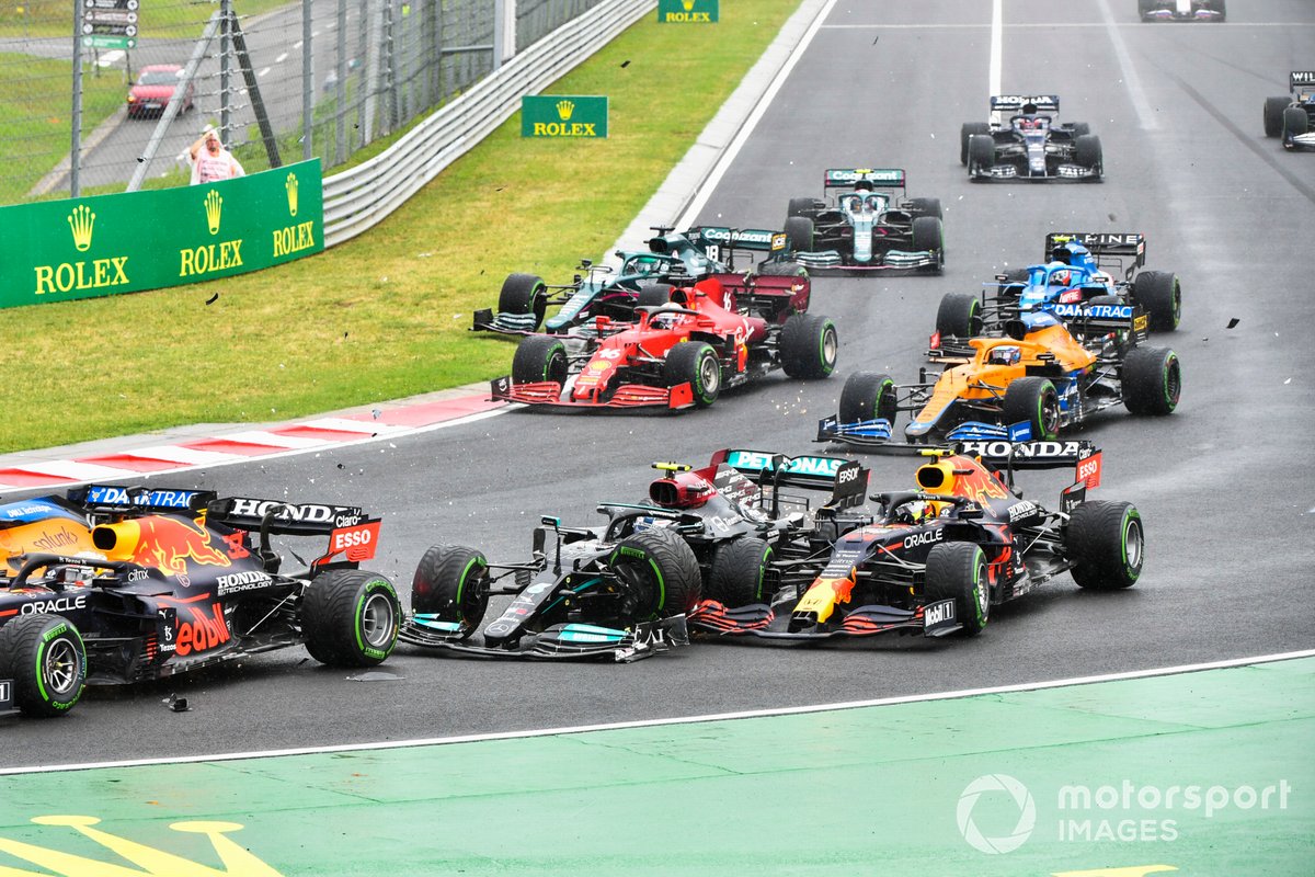 Valtteri Bottas, Mercedes W12, collides with Sergio Perez, Red Bull Racing RB16B, at the start