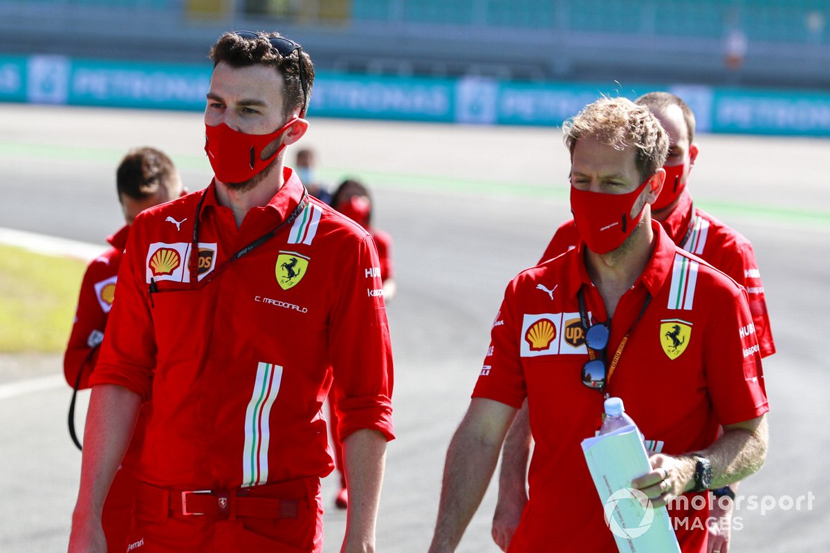 Sebastian Vettel, Ferrari, walks the track