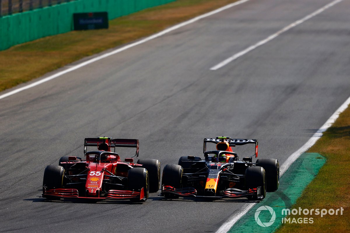 Carlos Sainz Jr., Ferrari SF21, battles with Sergio Perez, Red Bull Racing RB16B
