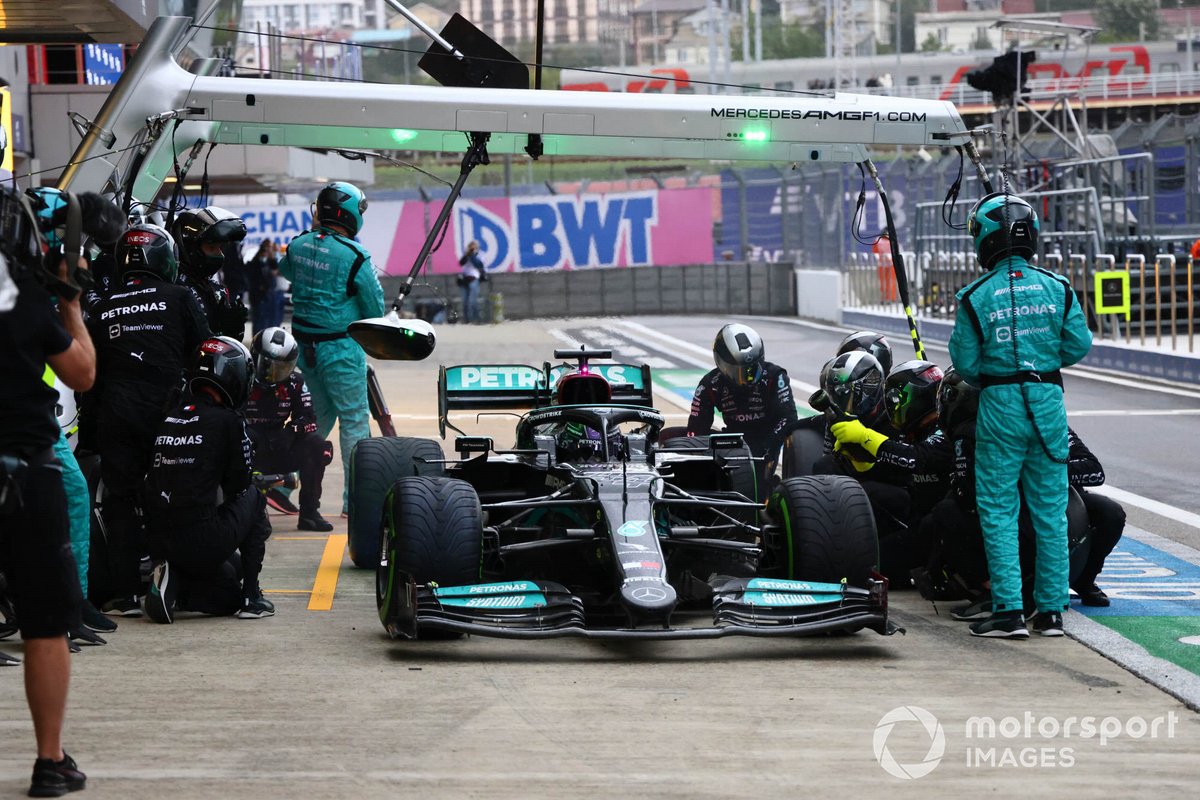 Lewis Hamilton, Mercedes W12, makes a pit stop