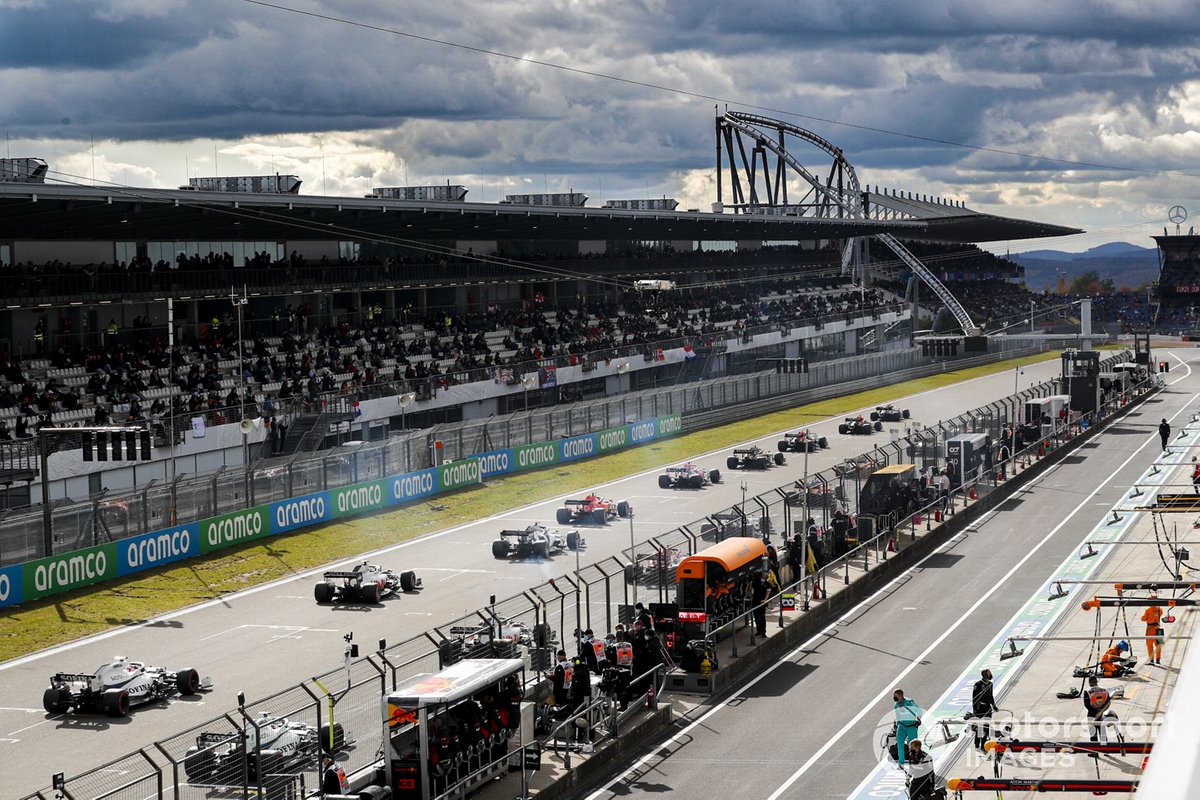 Cars line up on the grid before the start of the race