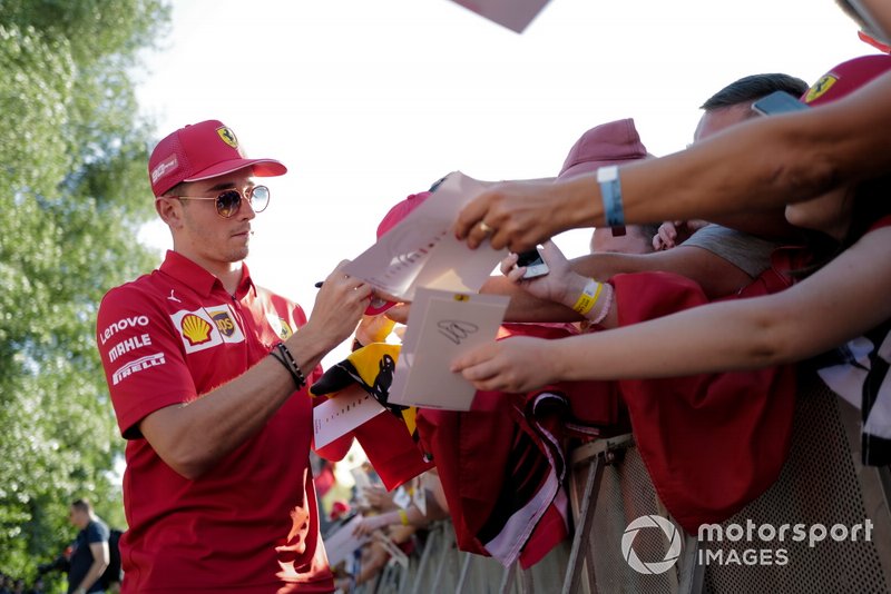 Charles Leclerc, Ferrari signs an autograph for a fan