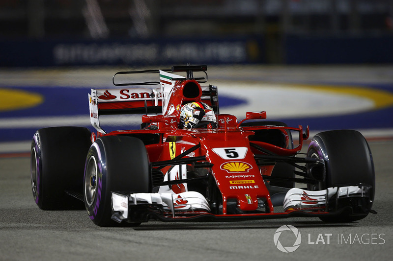 Pole man Sebastian Vettel, Ferrari SF70H, celebrates on his way to Parc Ferme