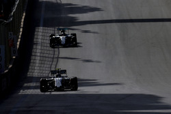 Valtteri Bottas, Williams FW38, leads Lewis Hamilton, Mercedes F1 W07 Hybrid