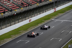 Pierre Gasly, Scuderia Toro Rosso STR13 and Max Verstappen, Red Bull Racing RB14