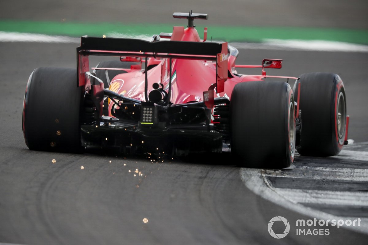 Sparks kick up from Sebastian Vettel, Ferrari SF1000