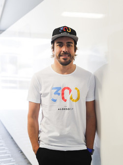 Fernando Alonso, McLaren, wears a tee shirt celebrating his 300th Grand Prix start