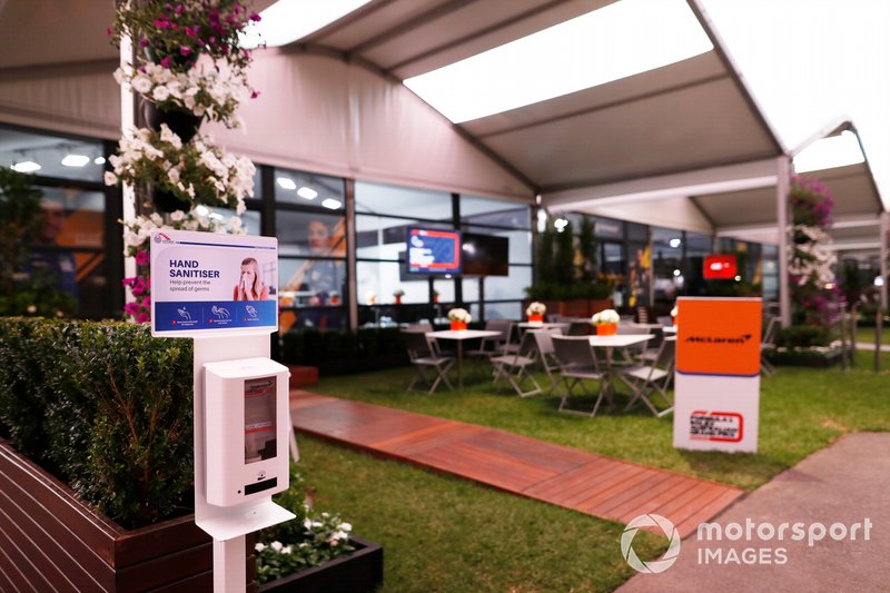 Hand Sanitiser dispenser outside the empty McLaren hospitality area in the paddock