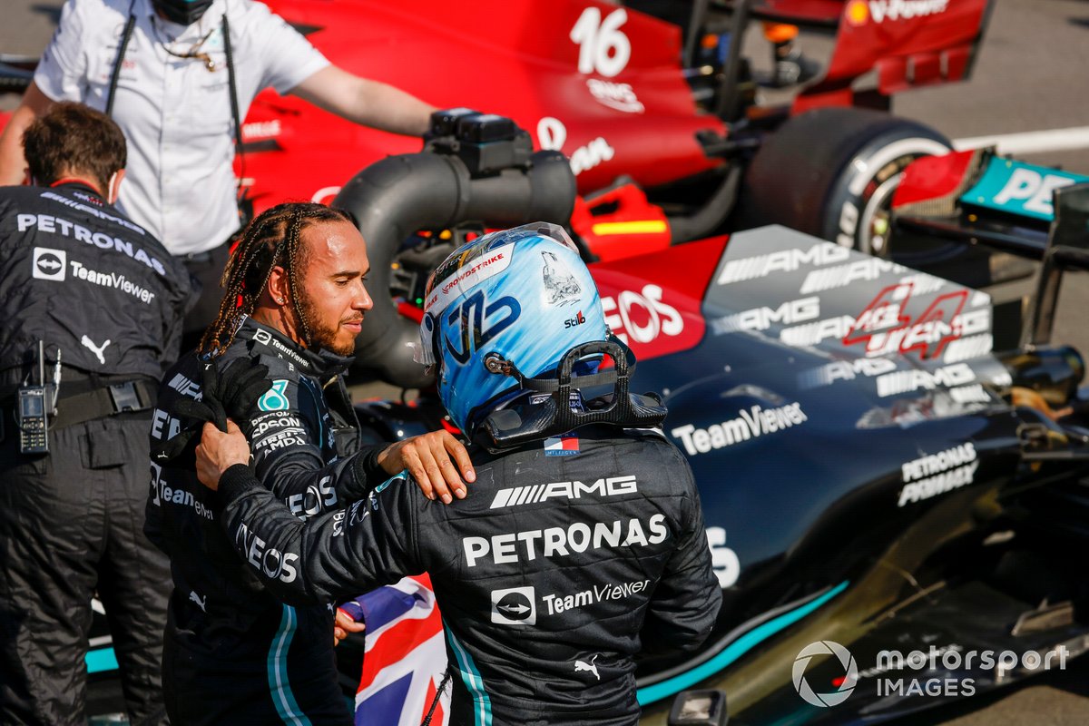 Lewis Hamilton, Mercedes, 1st position, is congratulated by Valtteri Bottas, Mercedes, 3rd position, in Parc Ferme