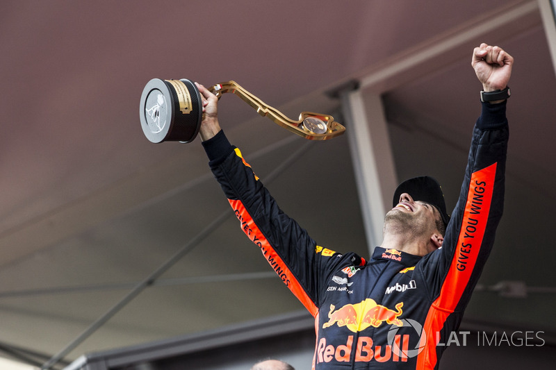 Race winner Daniel Ricciardo, Red Bull Racing celebrates on the podium with the trophy