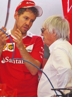 (L to R): Sebastian Vettel, Ferrari with Bernie Ecclestone