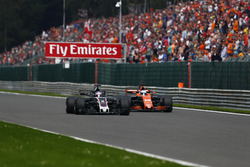 Romain Grosjean, Haas F1 Team VF-17, battles, Fernando Alonso, McLaren MCL32