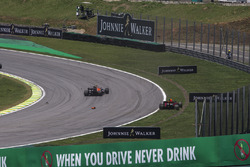 Daniel Ricciardo, Red Bull Racing RB13 and Stoffel Vandoorne, McLaren MCL32 collide at the start of