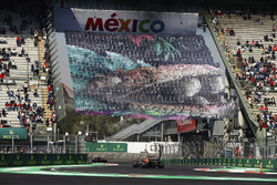 Fernando Alonso, McLaren MCL32, follows a Ferrari through the stadium section
