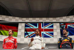 Race winner Lewis Hamilton, Mercedes AMG F1, second place Sebastian Vettel, Ferrari, third place Daniel Ricciardo, Red Bull Racing