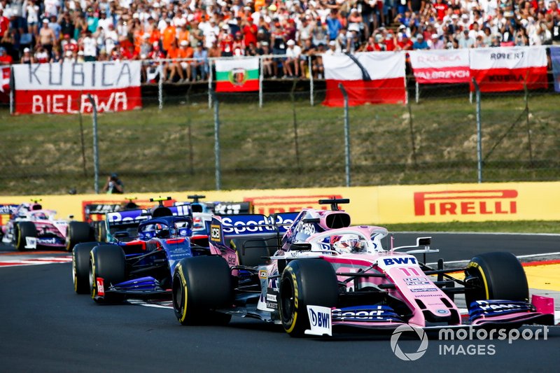 Sergio Perez, Racing Point RP19, leads Alexander Albon, Toro Rosso STR14, and George Russell, Williams Racing FW42