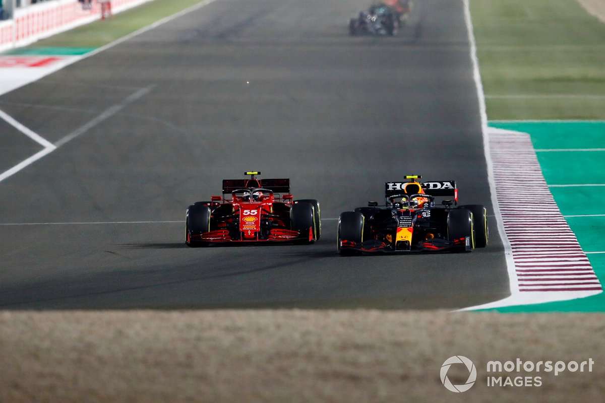 Carlos Sainz Jr., Ferrari SF21, battles with Sergio Perez, Red Bull Racing RB16B