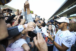Lewis Hamilton, Mercedes AMG F1, signs autographs for fans