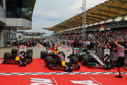 The cars of race winner Max Verstappen, Red Bull Racing RB13, Daniel Ricciardo, Red Bull Racing RB13