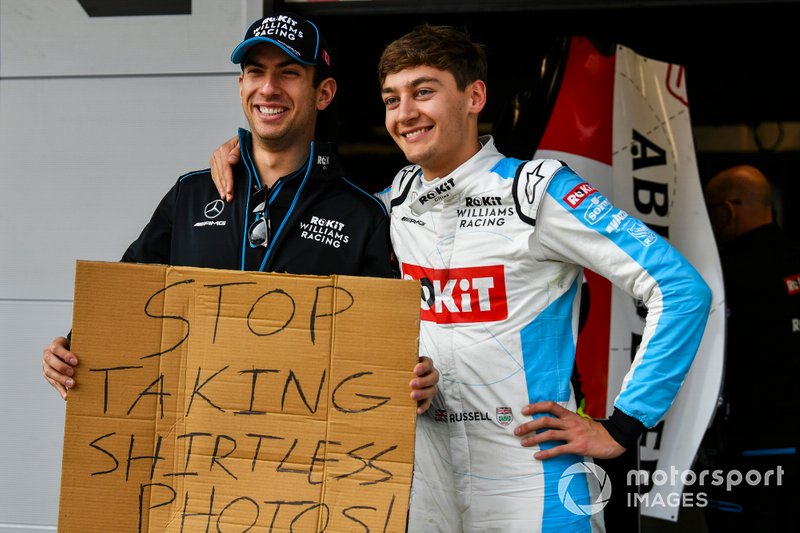Nicholas Latifi, Williams Racing, holds a message for George Russell, Williams Racing