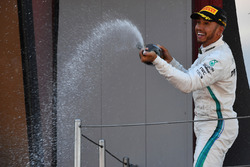 Lewis Hamilton, Mercedes-AMG F1 celebrates on the podium with the champagne