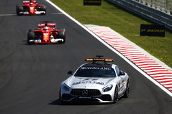 A safety car leads Sebastian Vettel, Ferrari SF70H, Kimi Raikkonen, Ferrari SF70H