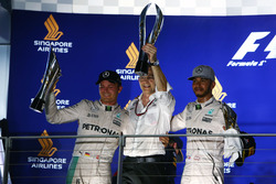 Race winner Nico Rosberg, Mercedes AMG F1 (Left) with third placed team mate Lewis Hamilton, Mercede