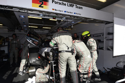 Crew members work on the #2 Porsche Team Porsche 919 Hybrid: Timo Bernhard, Earl Bamber, Brendon Har