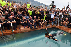 Race winner Daniel Ricciardo, Red Bull Racing celebrates in the Red Bull Energy Station swimming pool