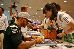 Lewis Hamilton, Mercedes AMG F1 signs autographs for the fans