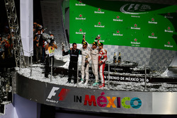 The podium (L to R): Tony Walton, Mercedes AMG F1 Mechanic; Nico Rosberg, Mercedes AMG F1, second; Lewis Hamilton, Mercedes AMG F1, race winner; Sebastian Vettel, Ferrari, third