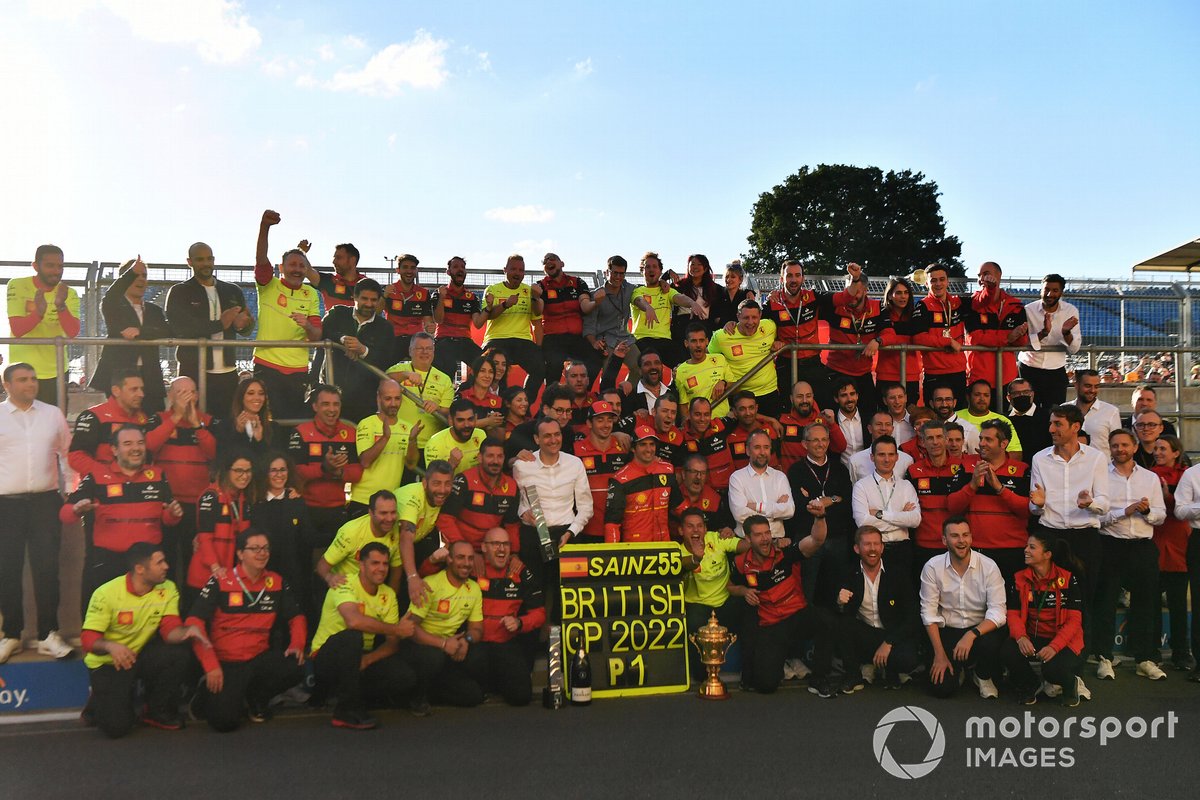 The Ferrari team celebrate the win with Carlos Sainz, Ferrari