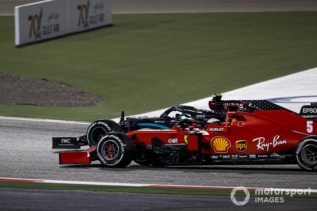 Valtteri Bottas, Mercedes F1 W11, battles with Sebastian Vettel, Ferrari SF1000