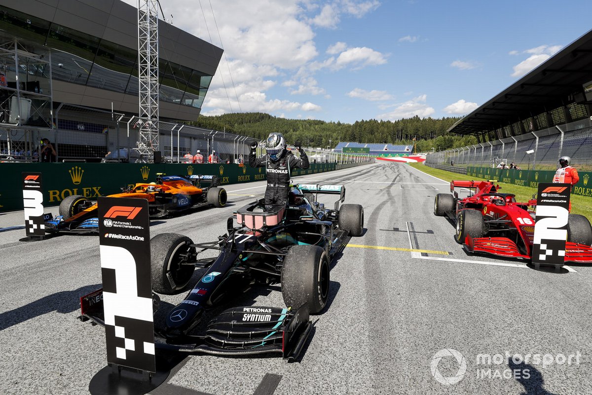 Race winner Valtteri Bottas, Mercedes-AMG Petronas F1, Charles Leclerc, Ferrari SF1000 and Lando Norris, McLaren MCL35 drives into parc ferme