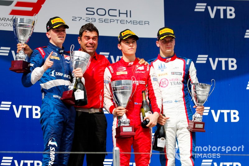 Champion Robert Shwartzman, PREMA Racing, celebrates on the podium with team boss Rene Rosin, race winner Marcus Armstrong, PREMA Racing and Niko Kari, Trident