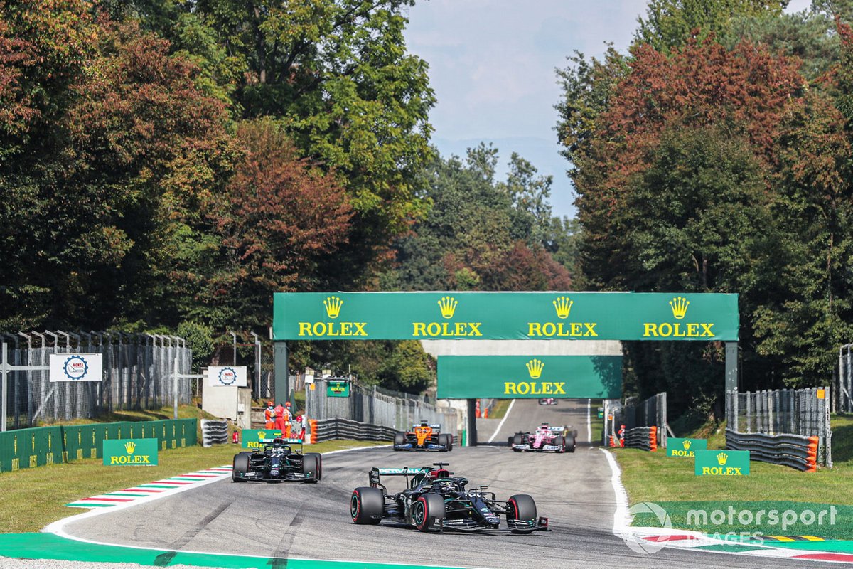Lewis Hamilton, Mercedes F1 W11, Valtteri Bottas, Mercedes F1 W11, and Carlos Sainz Jr., McLaren MCL35, on the formation lap