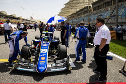 Zak Brown, McLaren, watches Lando Norris, Carlin