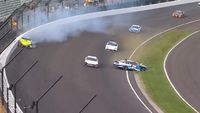Hill makes contact with Almirola, sending Almirola hard into the outside wall